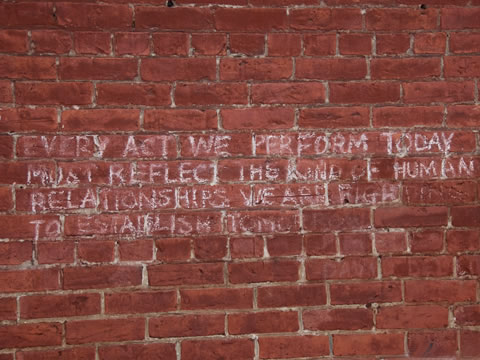 writing on a brick wall
