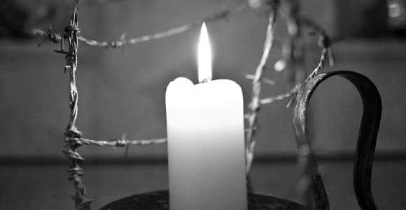 candle and barbed wire