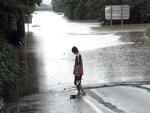 teenager by a flood