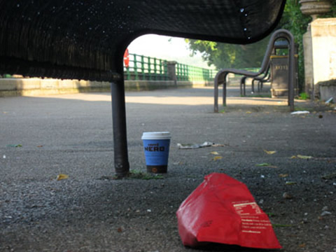 rubbish under a bench